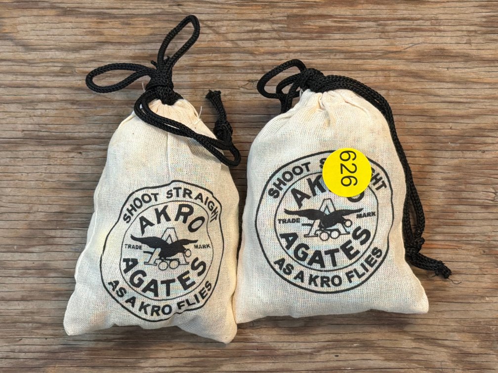 TWO SMALL BAGS OF MARBLES
