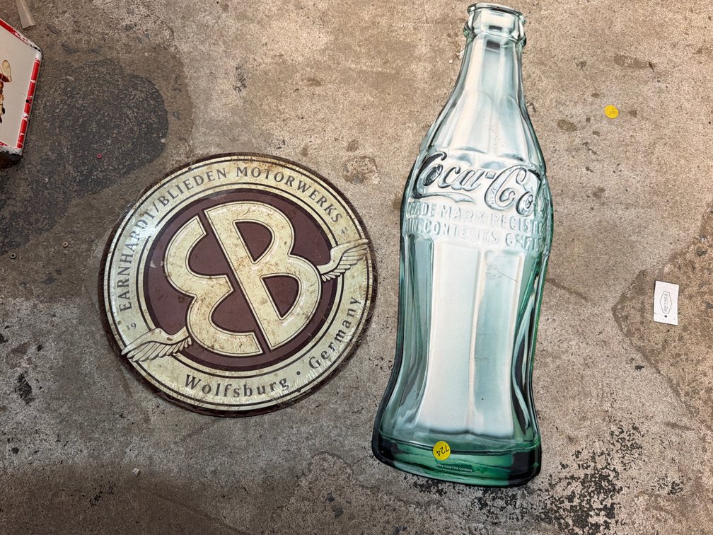 TWO METAL SIGNS