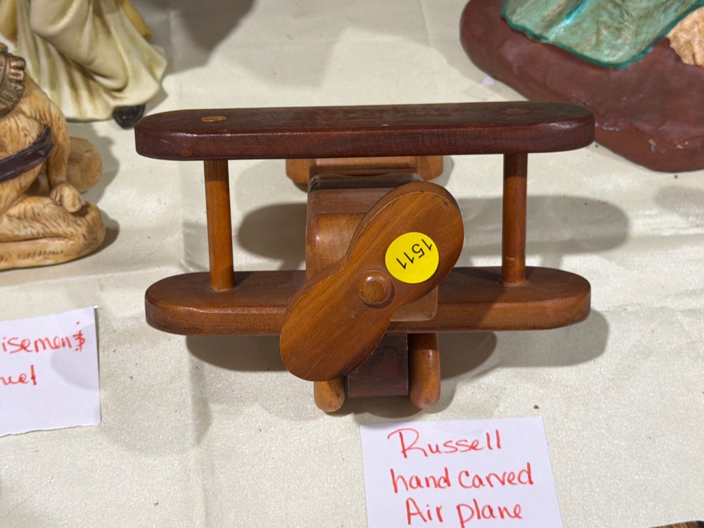 RUSSELL HAND CARVED AIR PLANE