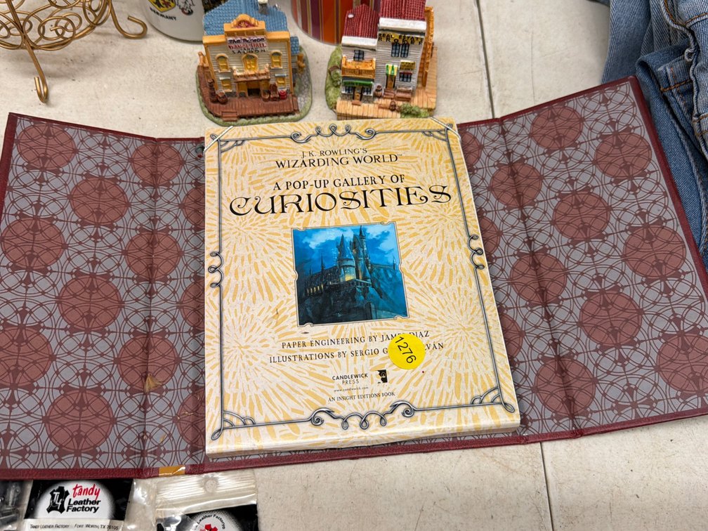 WIZARDING WORLD POP UP GALLERY CURIOSITIES BOOK