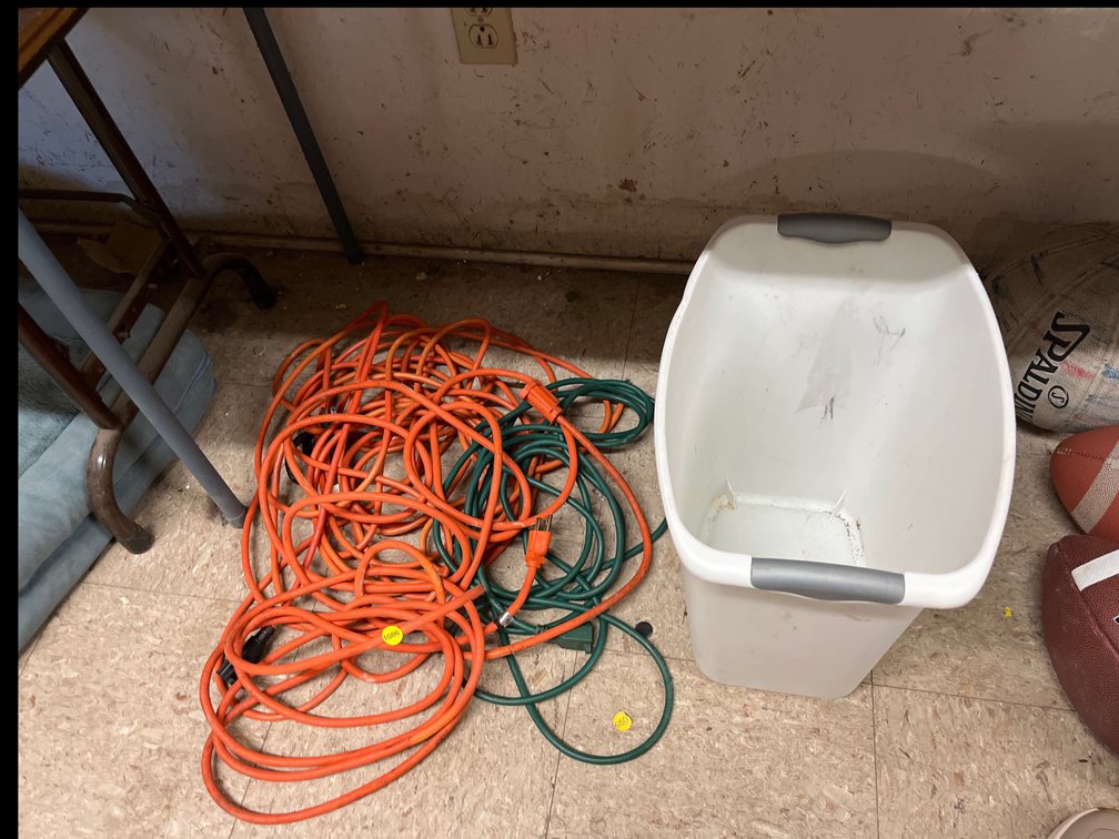 EXTENSION CORDS AND TRASH CAN