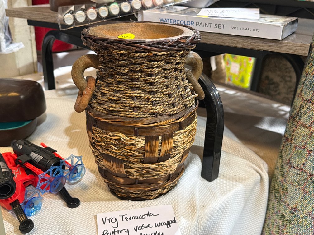 VINTAGE TERRACOTTA POTTERY VASE WRAPPED IN WOVEN WICKER