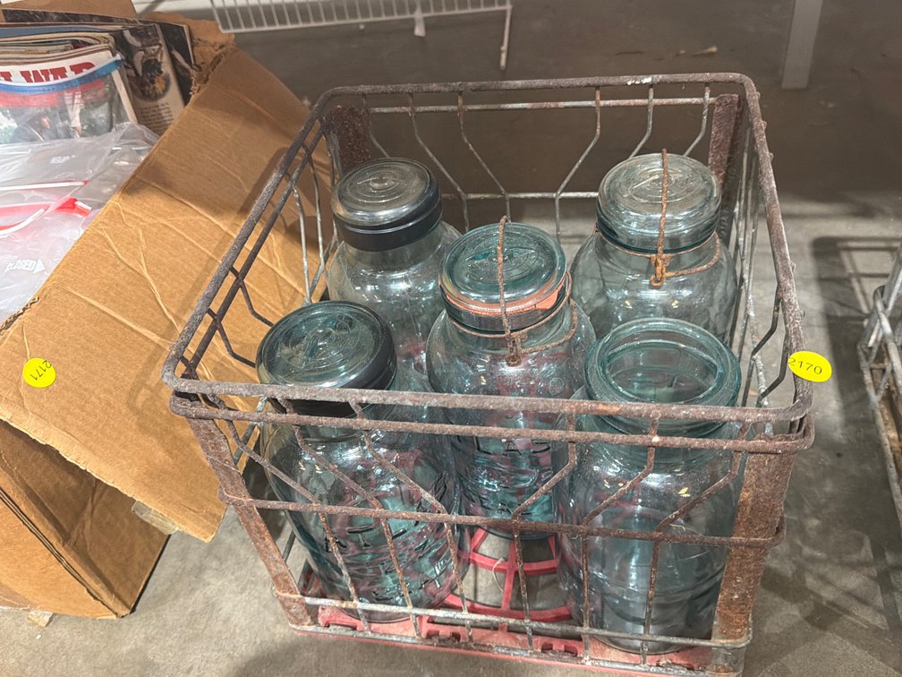 VINTAGE METAL MILK CRATE WITH LARGE BLUE ATLAS JARS