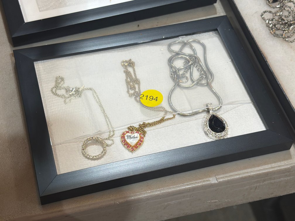 THREE NECKLACES
