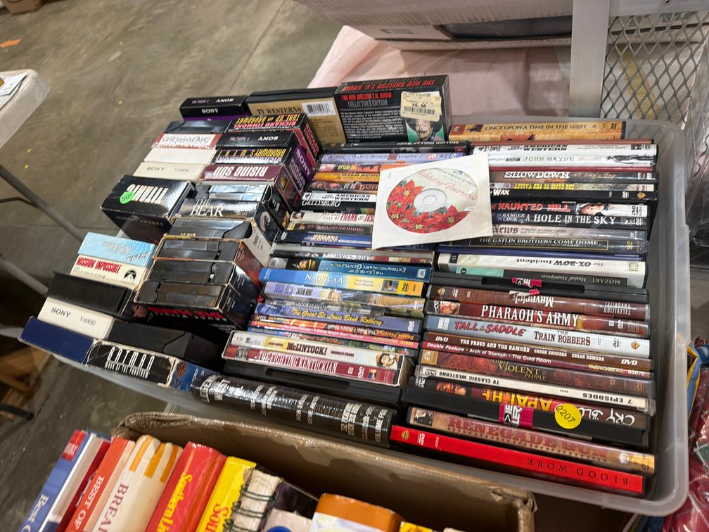 LOT OF DVDS AND VHS TAPES