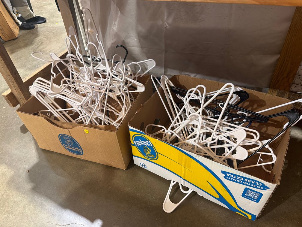 TWO BOXES OF HANGERS