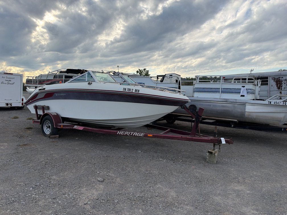 CELEBRITY BOAT AND TRAILER (bad motor)