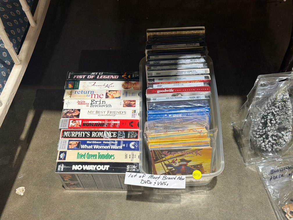 LOT OF DVDS AND VHS TAPES