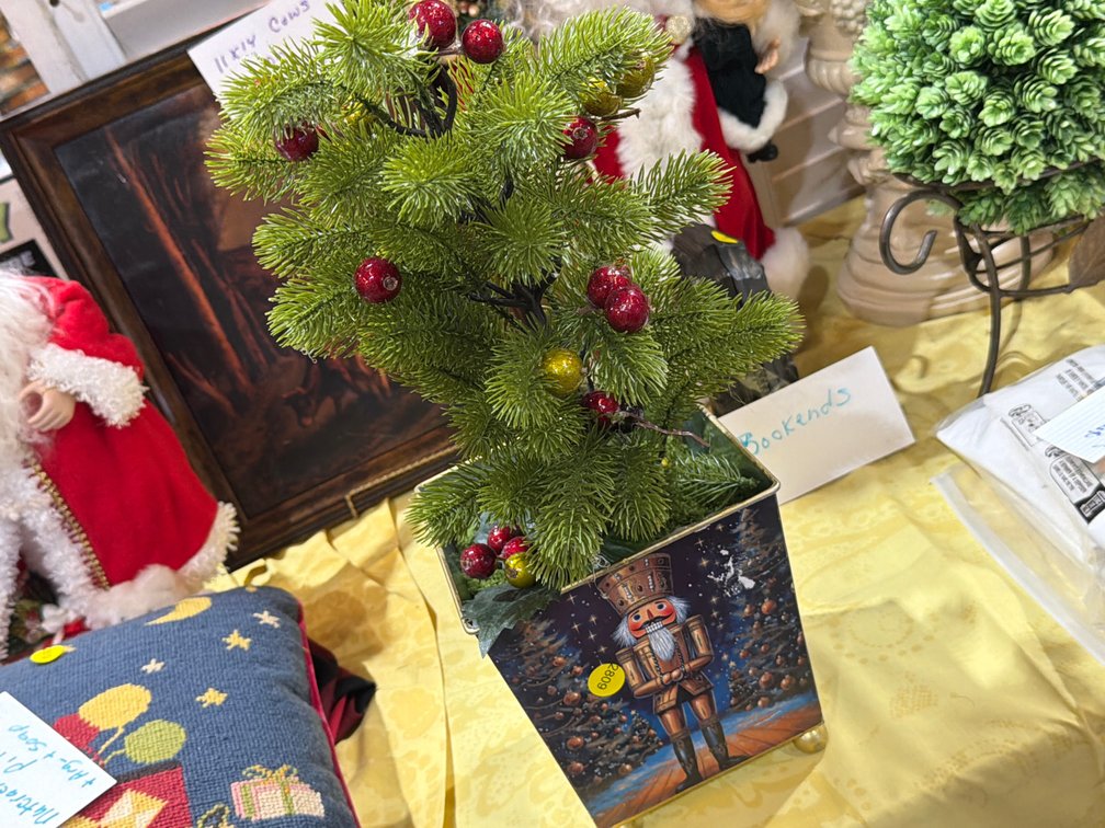 NUTCRACKER PLANTER WITH ARTIFICIAL PLANT
