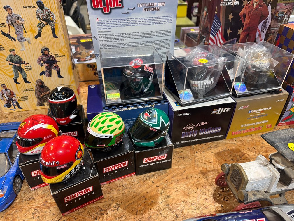 LOT OF RACING MINI HELMETS