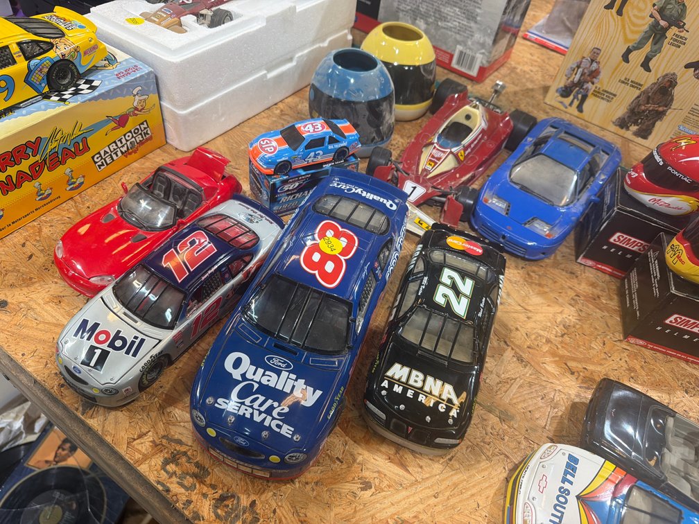 DIE CAST RACE CARS AND TWO MUGS