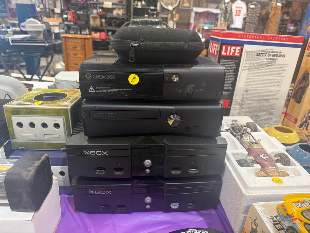 BOSE HEADPHONES AND 4 XBOX CONSOLES