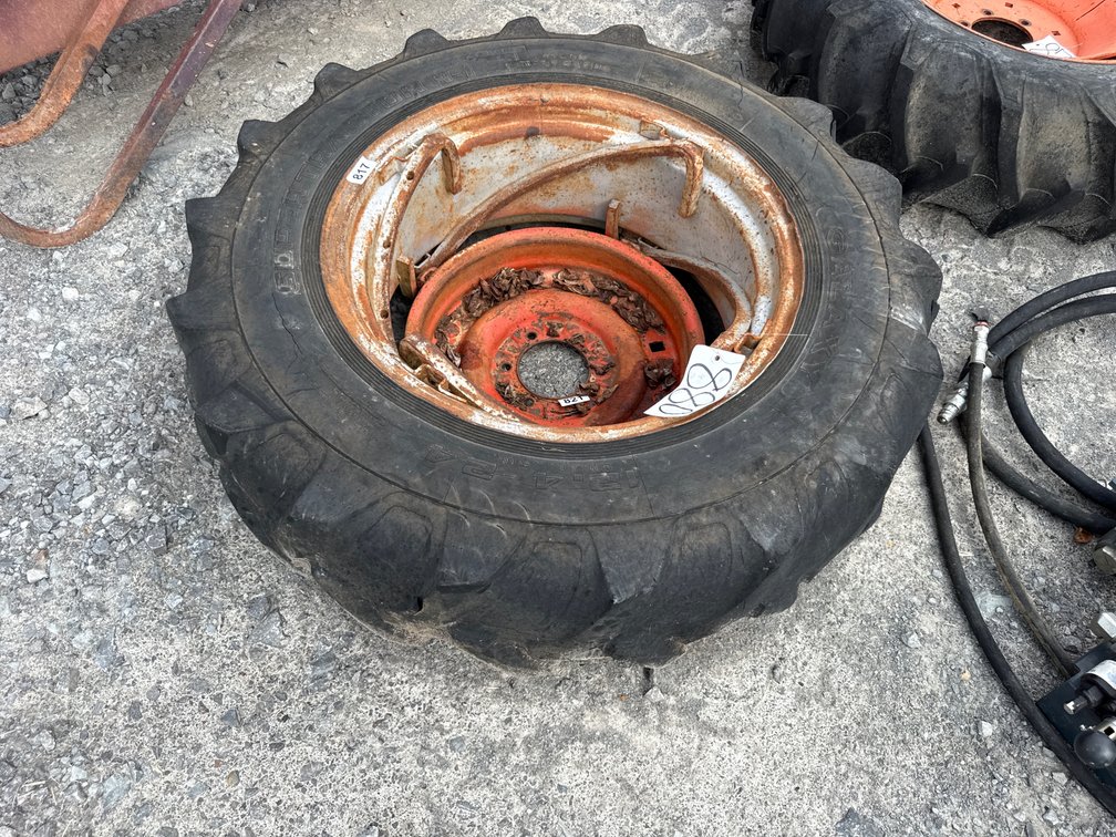 12.4-24 TRACTOR TIRE AND SPIN OUT RIM
