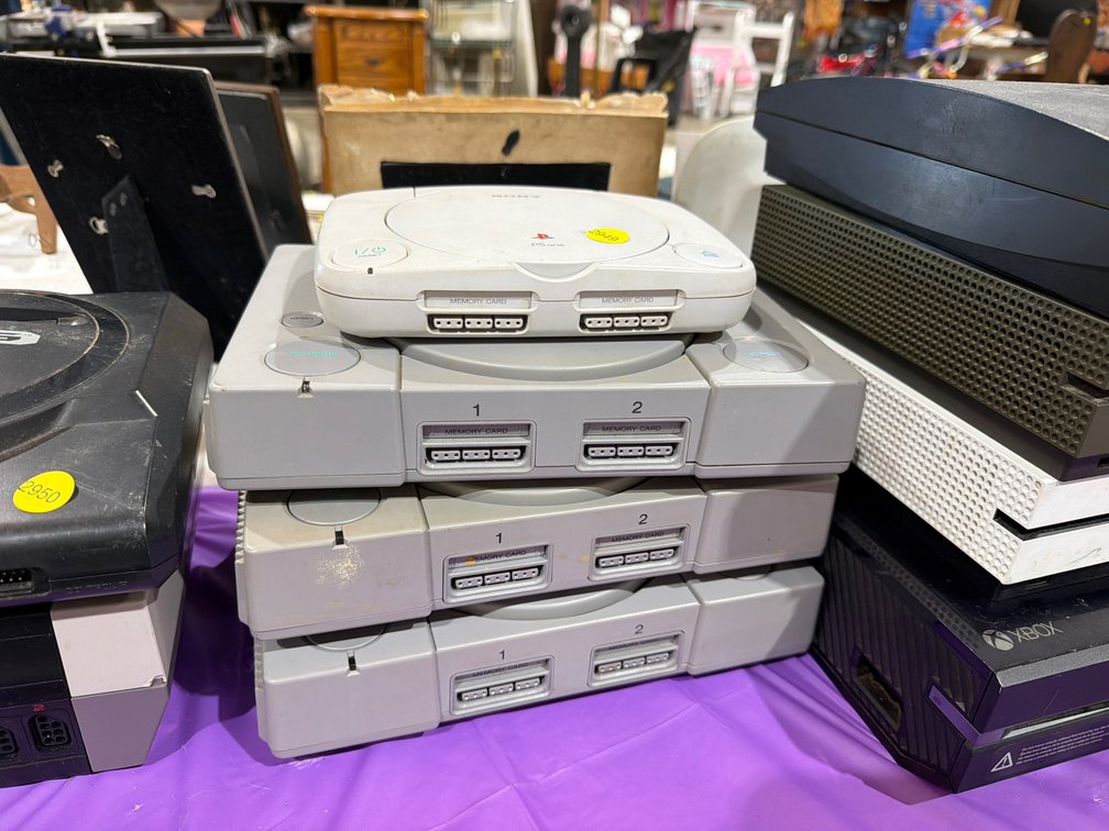 4 PLAYSTATION CONSOLES (NO CORDS)