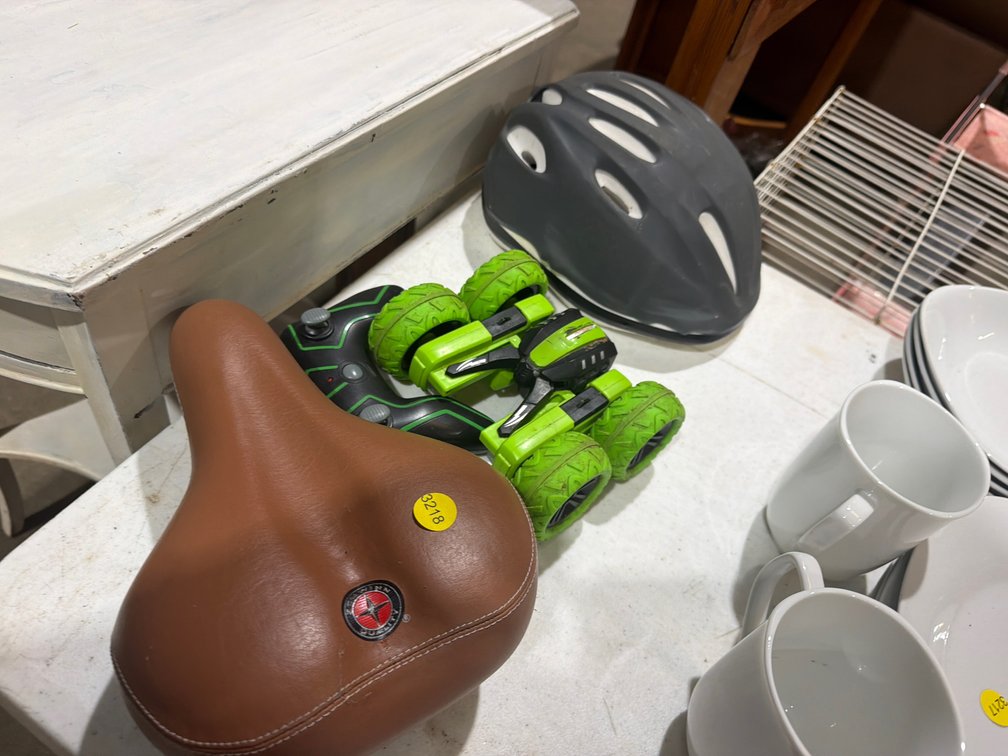 BICYCLE SEAT, HELMET, AND RC CAR