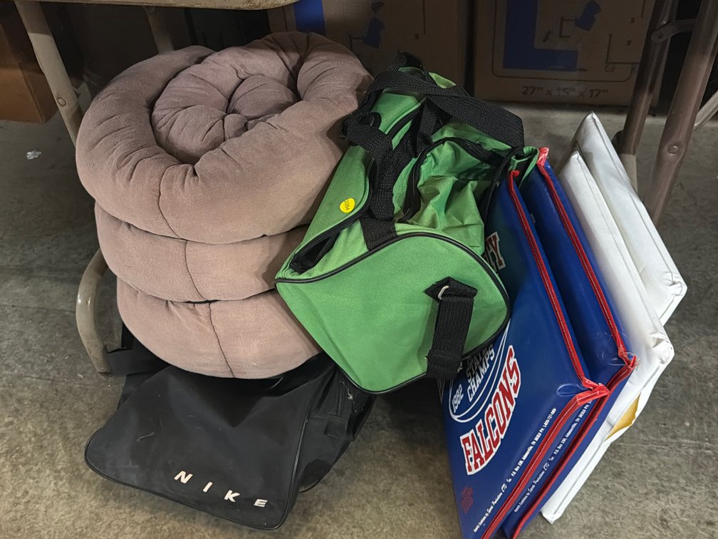 SLEEPING BAG, DUFFLE BAGS, AND STADIUM CUSHIONS