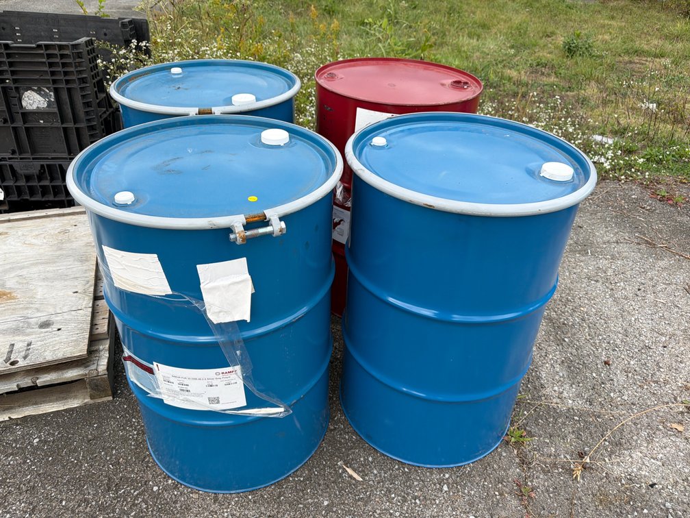(4) METAL BARRELS