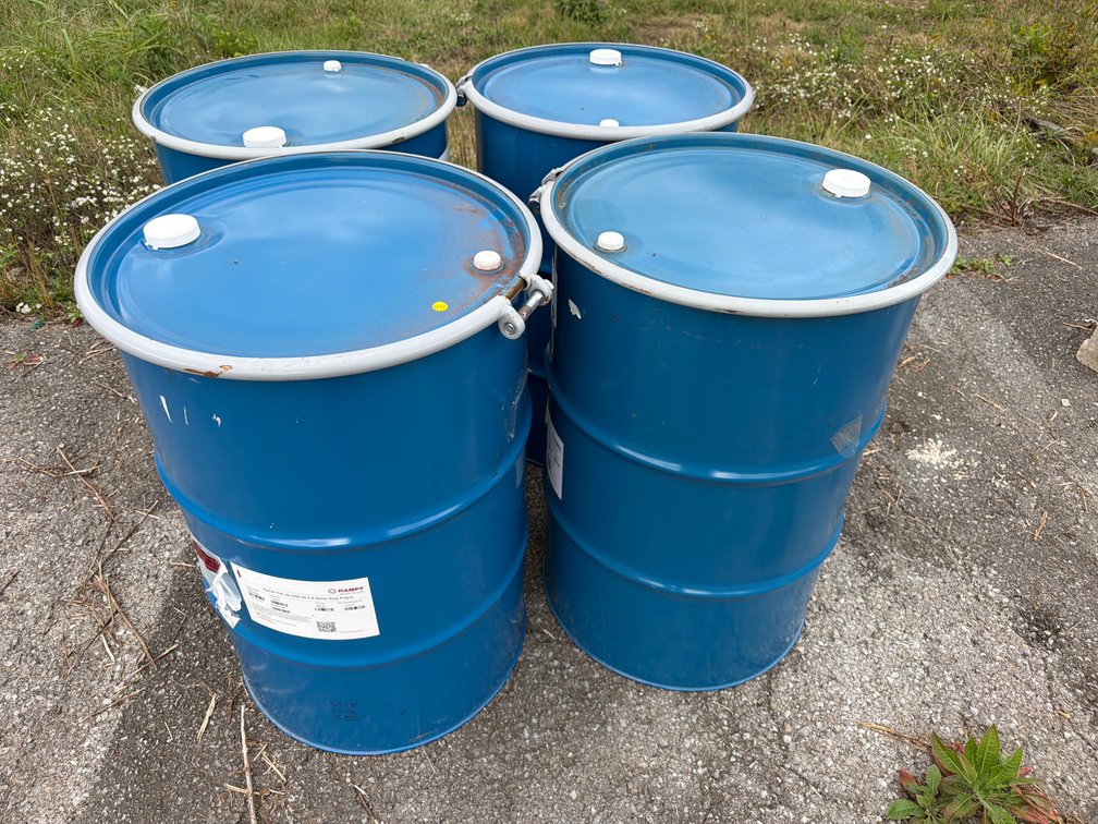 (4) METAL BARRELS