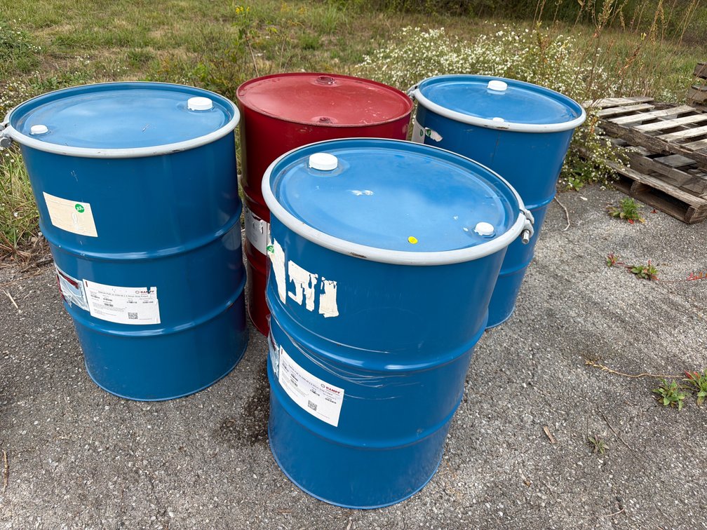 (4) METAL BARRELS