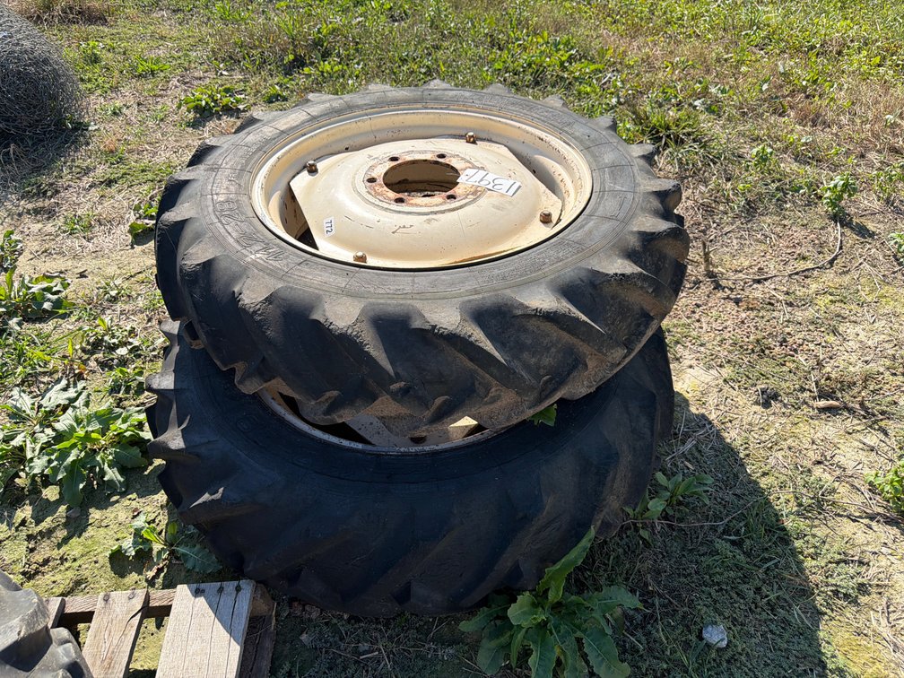 (2) 11.2-28 TIRES AND WHEELS