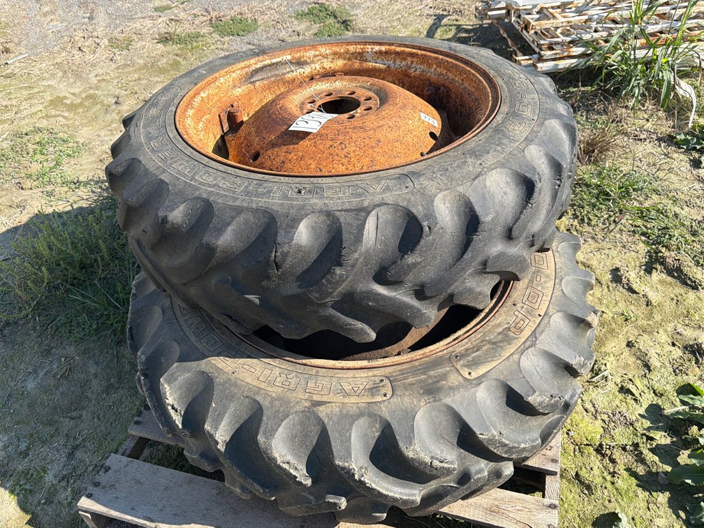 (2) 11.2-28 TIRES AND WHEELS
