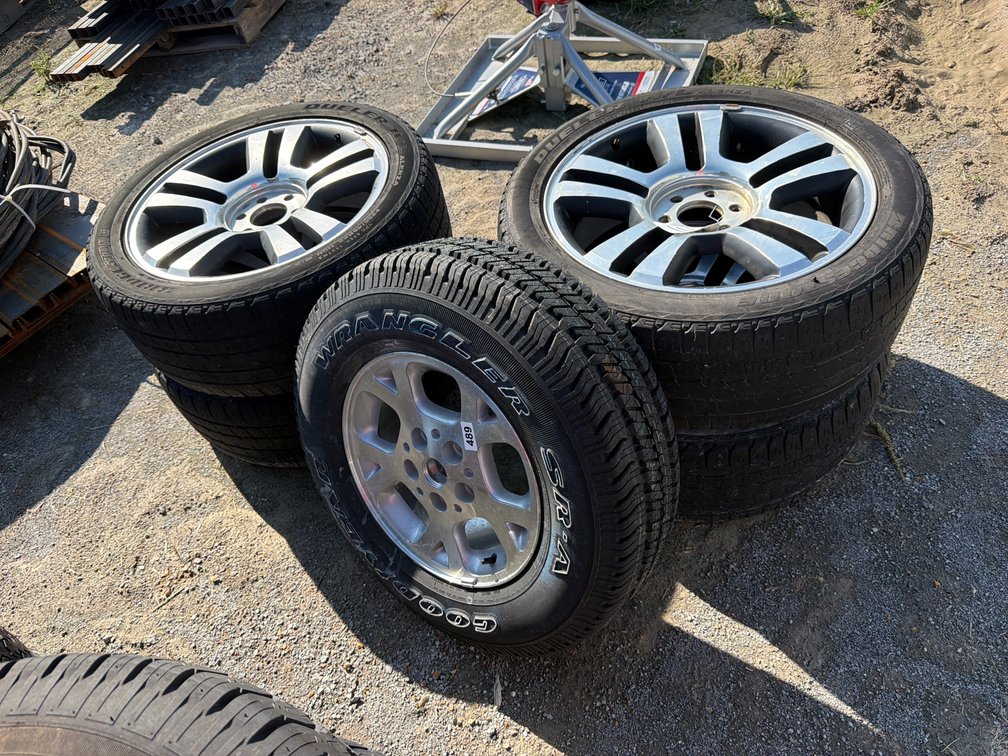 (4) 22” FORD RIMS AND TIRES, (1) JEEP TIRE AND RIM