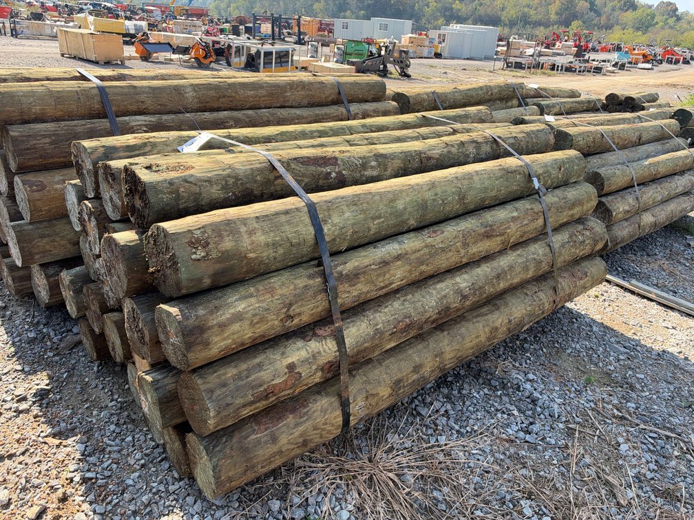 BUNDLE OF (25) 7”-8”X8’ TREATED POSTS