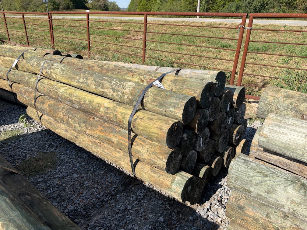 BUNDLE OF (25) 7”-8”X8’ TREATED POSTS