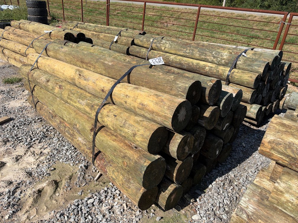 BUNDLE OF (25) 7”-8”X8’ TREATED POSTS