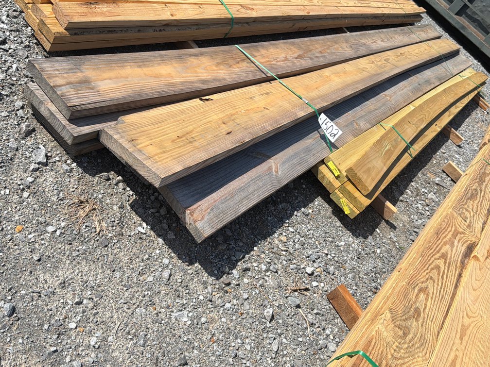 TWO BUNDLES OF LUMBER