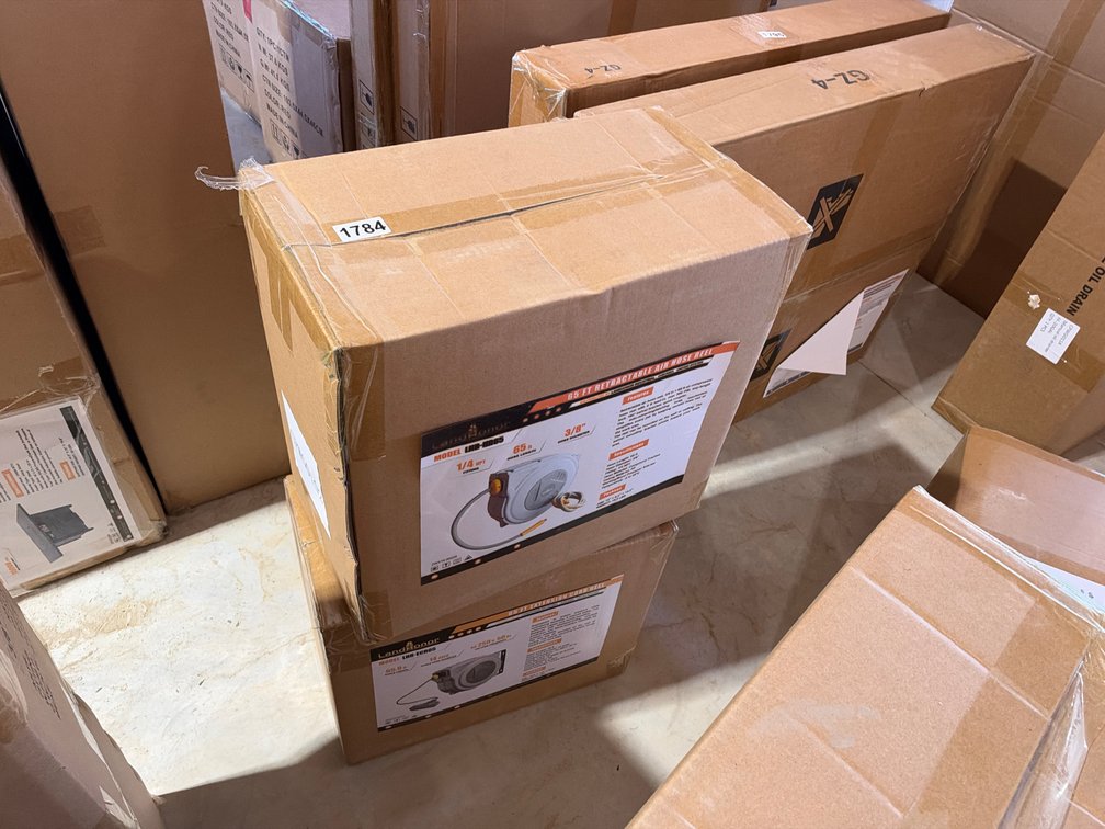 RETRACTABLE AIR HOSE AND EXTENSION CORD