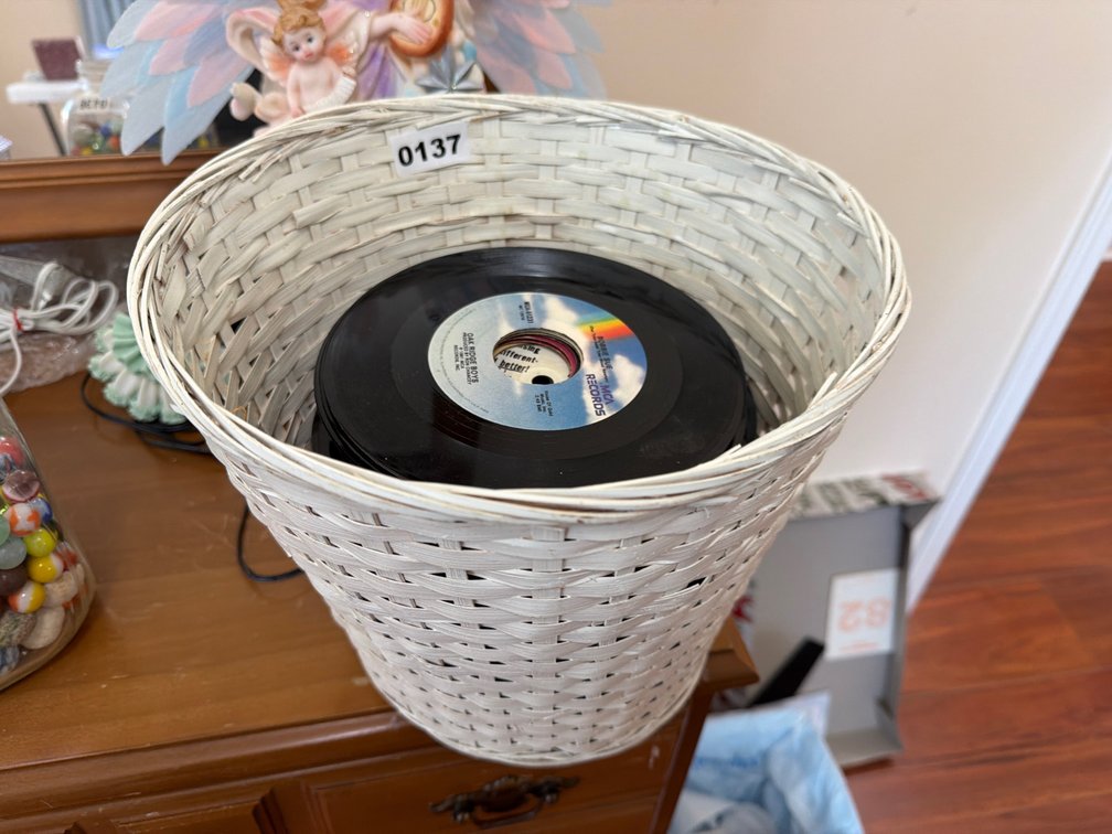 BASKET OF 45 RPM RECORDS
