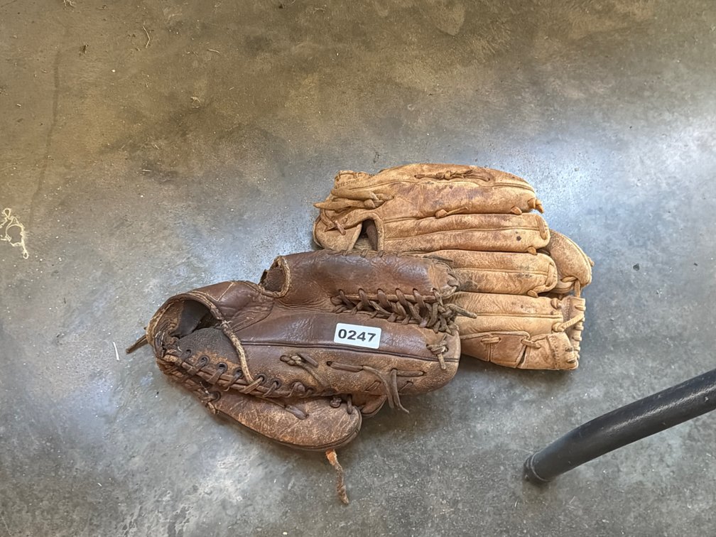 TWO VINTAGE BASEBALL GLOVES