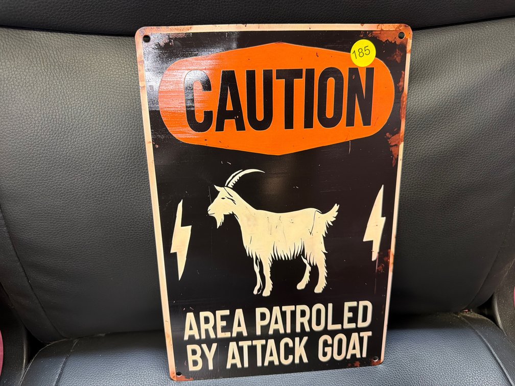 ATTACK GOAT METAL SIGN
