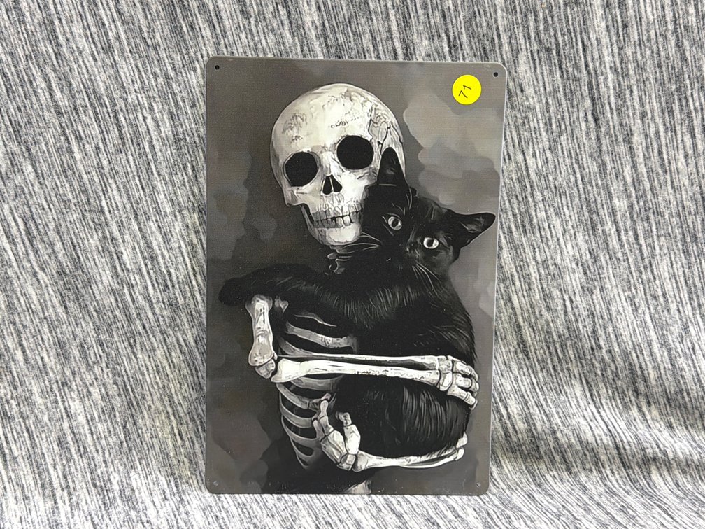 CAT AND SKELETON SIGN