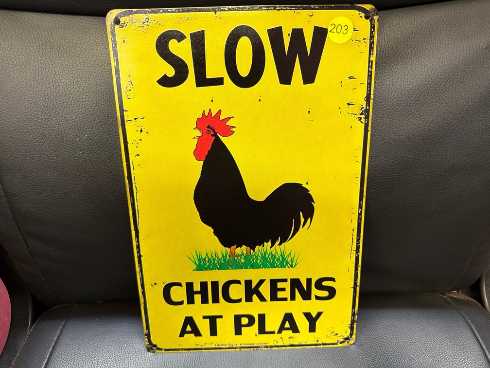SLOW CHICKENS SIGN