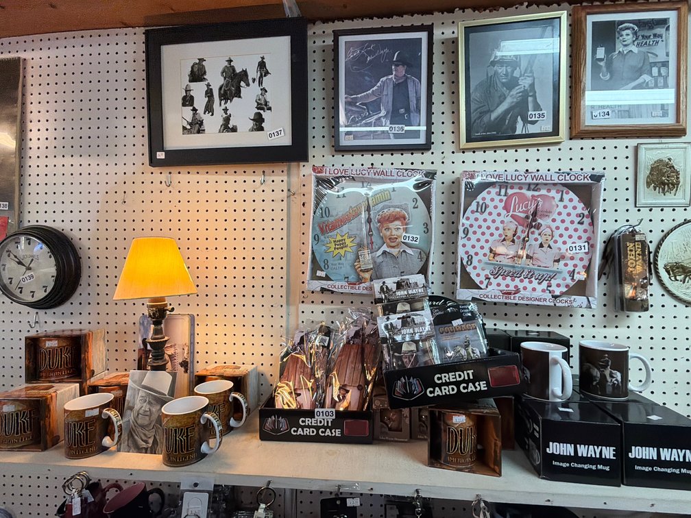 JOHN WAYNE ITEMS ON SHELF