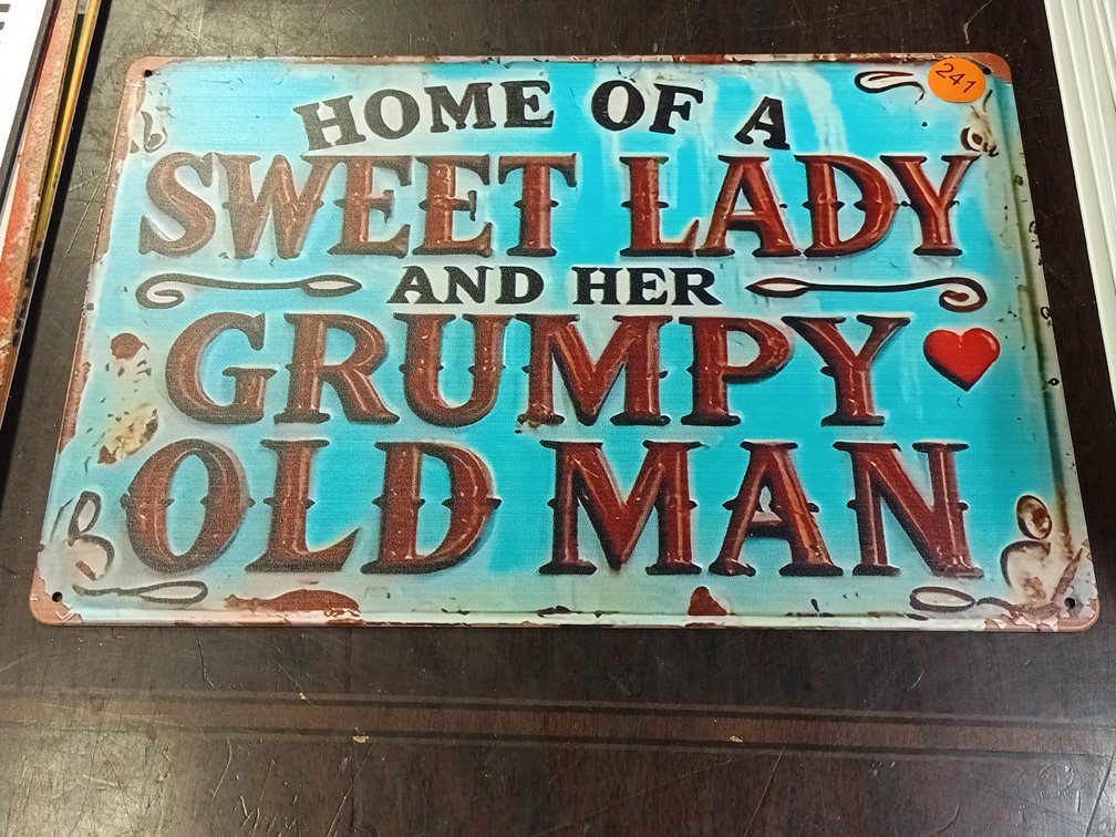 HOME OF SWEET LADY SIGN
