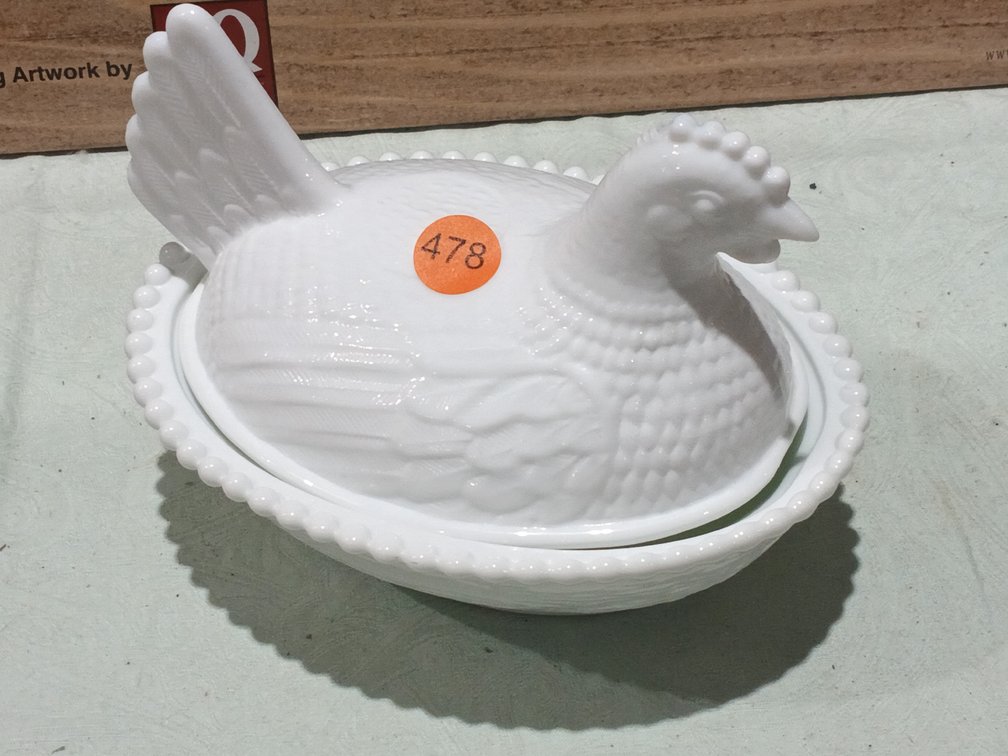 MILK WHITE HEN ON NEST