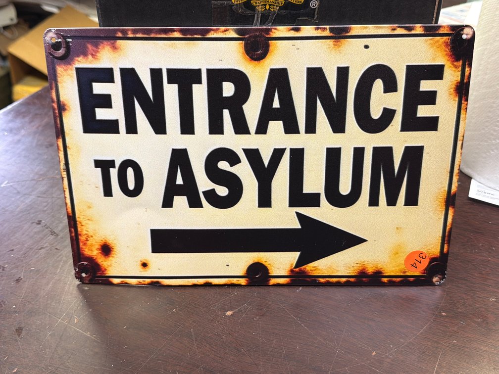 ASYLUM SIGN