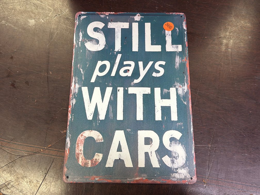 SILL PLAYS WITH CARS SIGN