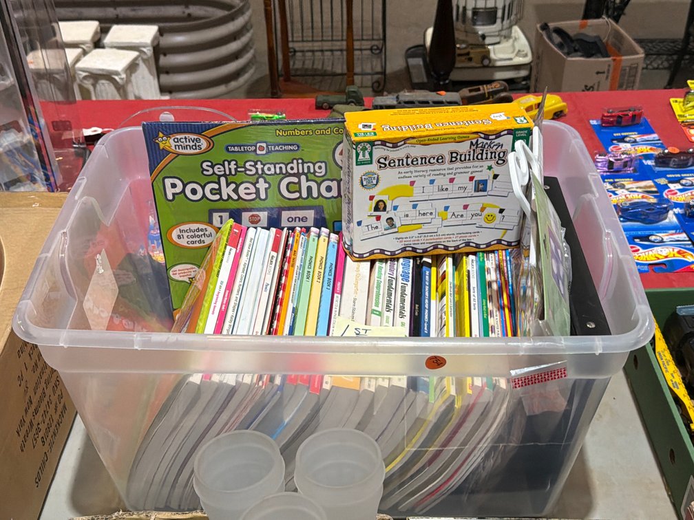 TOTE OF FIRST GRADE HOMESCHOOL BOOKS