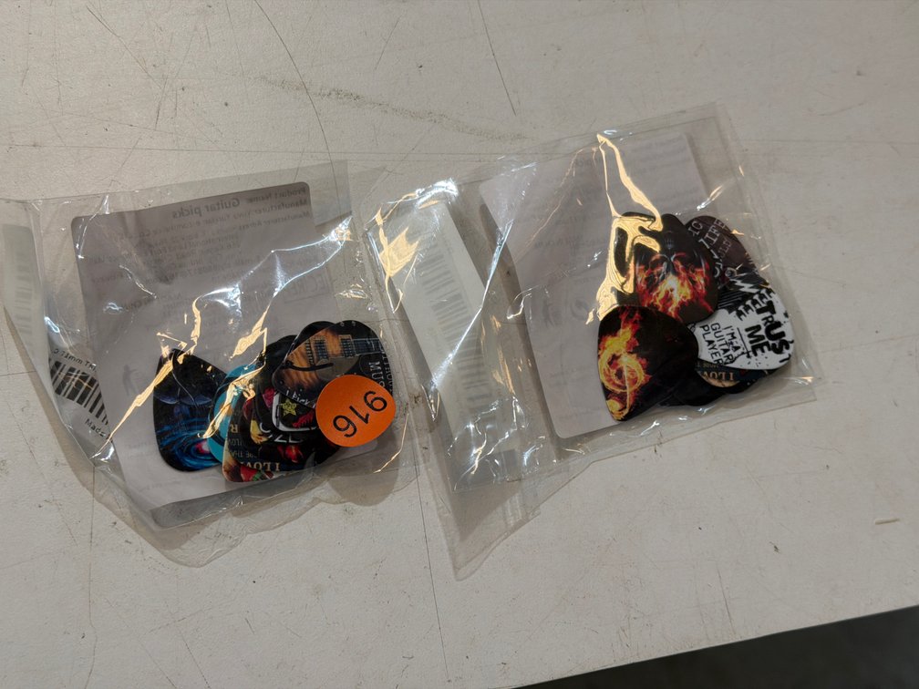 TWO PACKS OF GUITAR PICKS