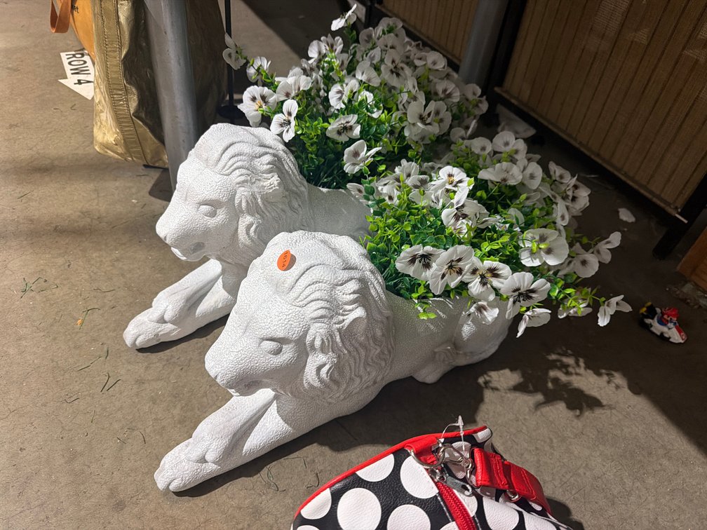 PAIR OF PLASTIC LION PLANTERS