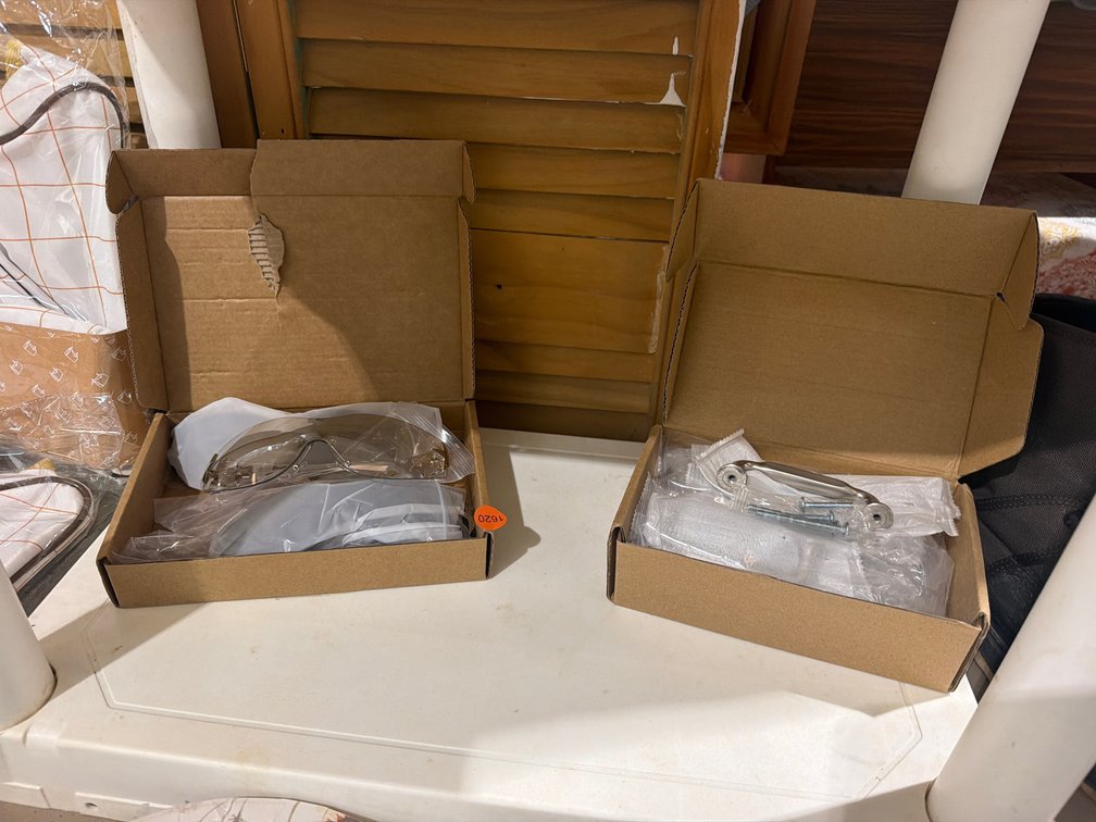 TWO PAIRS OF GLASSES AND DRAWER PULLS