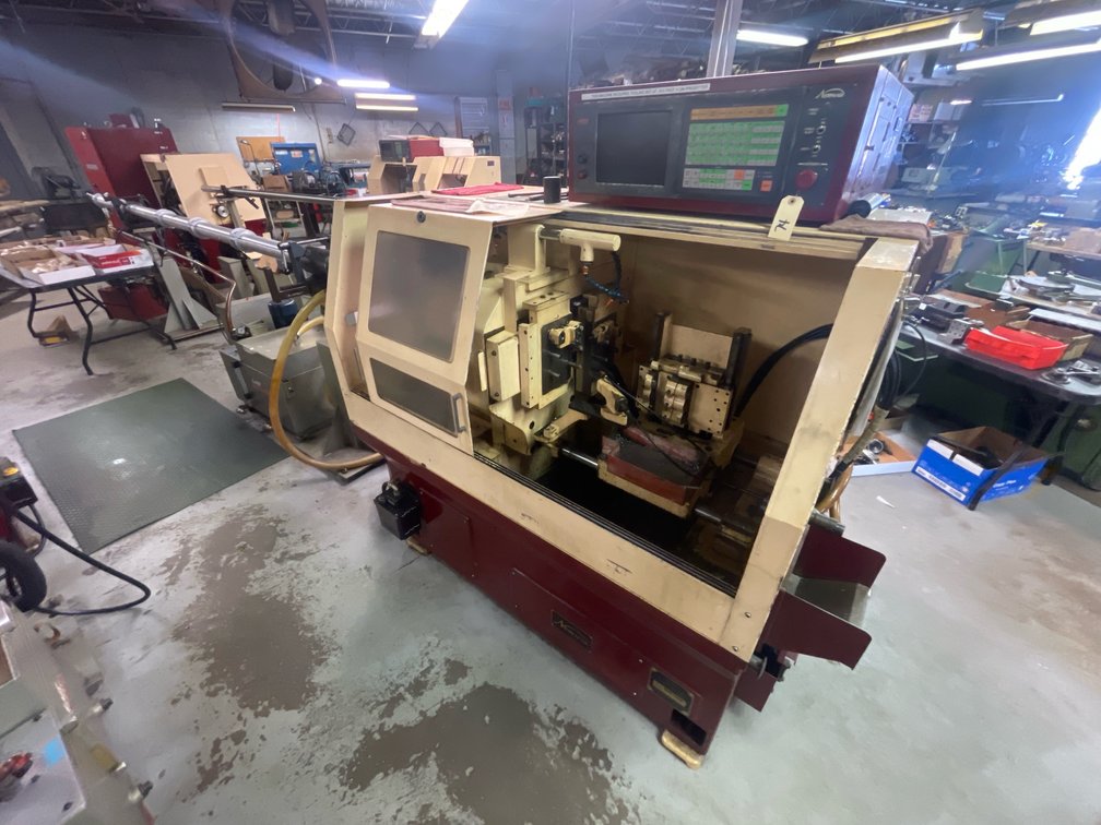 Nomura NN-10K CNC Swiss Type Automatic Screw Machine with Bar Feed