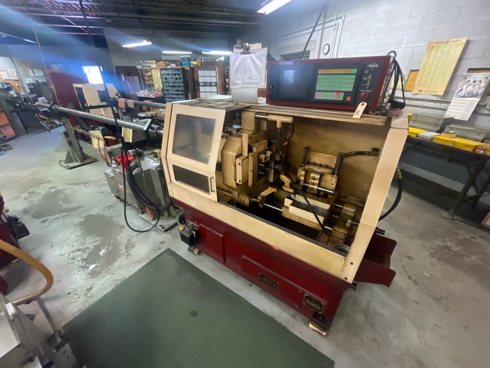 Nomura NN-12K CNC Swiss Type Automatic Screw Machine with Bar Feed