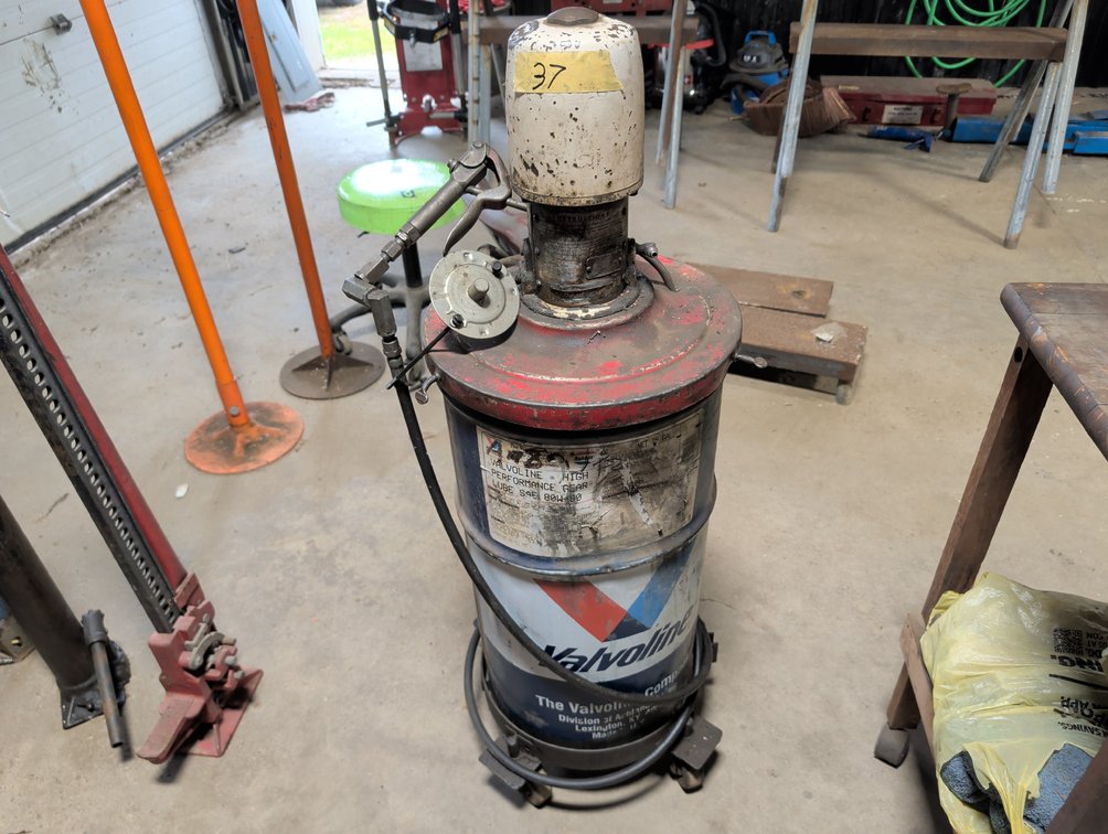 Oil Dispenser With Valvoline Drum On Casters