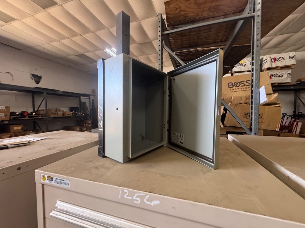 Electrical Enclosure With Mounting Bracket