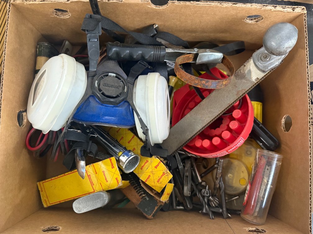 Assortment Of Work Tools And Supplies